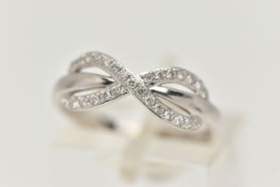 A 9CT GOLD AND DIAMOND RING, white gold infinity design ring, grain set with round brilliant cut