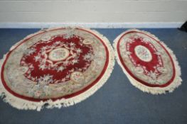 A RED AND CREAM CIRCULAR CHINESE WOOLLEN RUG, with central medallion and foliate details, diameter