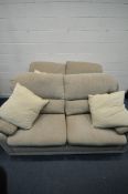 A BEIGE UPHOLSTERED TWO PIECE LOUNGE SUITE, comprising a pair of two seater sofas, length 195cm x
