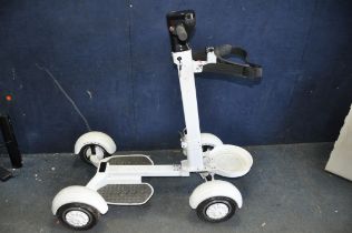 A 'GOLF SKATE CADDY' ELECTRIC GOLF BIKE with two keys, 2 fobs, one battery and one charger (PAT pass