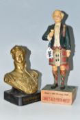 TWO WHISKY ADVERTISING FIGURES, comprising a rubberoid 'Currie's No 10 Perth Whisky' advertising