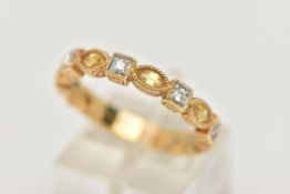 A DIAMOND AND SAPPHIRE BAND RING, comprised of six marquise cut yellow sapphires and five round