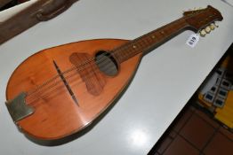 AN UNBRANDED EIGHT STRING NEAPOLITAN MANDOLIN, approximate length 60cm, Condition report: no obvious