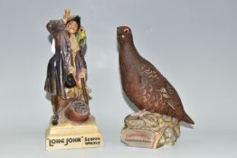 A SCOTCH WHISKY ADVERTISING FIGURE AND DECANTER, comprising a chalkware 'Long John Scotch Whisky'