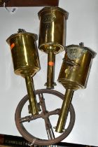 A GROUP OF BRASS ROASTING JACKS, three roasting jacks with one cast iron circular rack, one