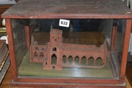 A MODEL OF THE SWEET HEART ABBEY, New Abbey Dumfries in a wooden and glass glazed case, height