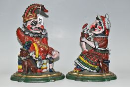 TWO CAST IRON DOORSTOPS, painted in the forms of Mr. Punch and Judy, height of tallest 30cm (2) (