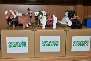 TWELVE BOXED ENESCO 'COUNTRYSIDE COUTURE' FIGURES, comprising two each of Douglas the Highland cow