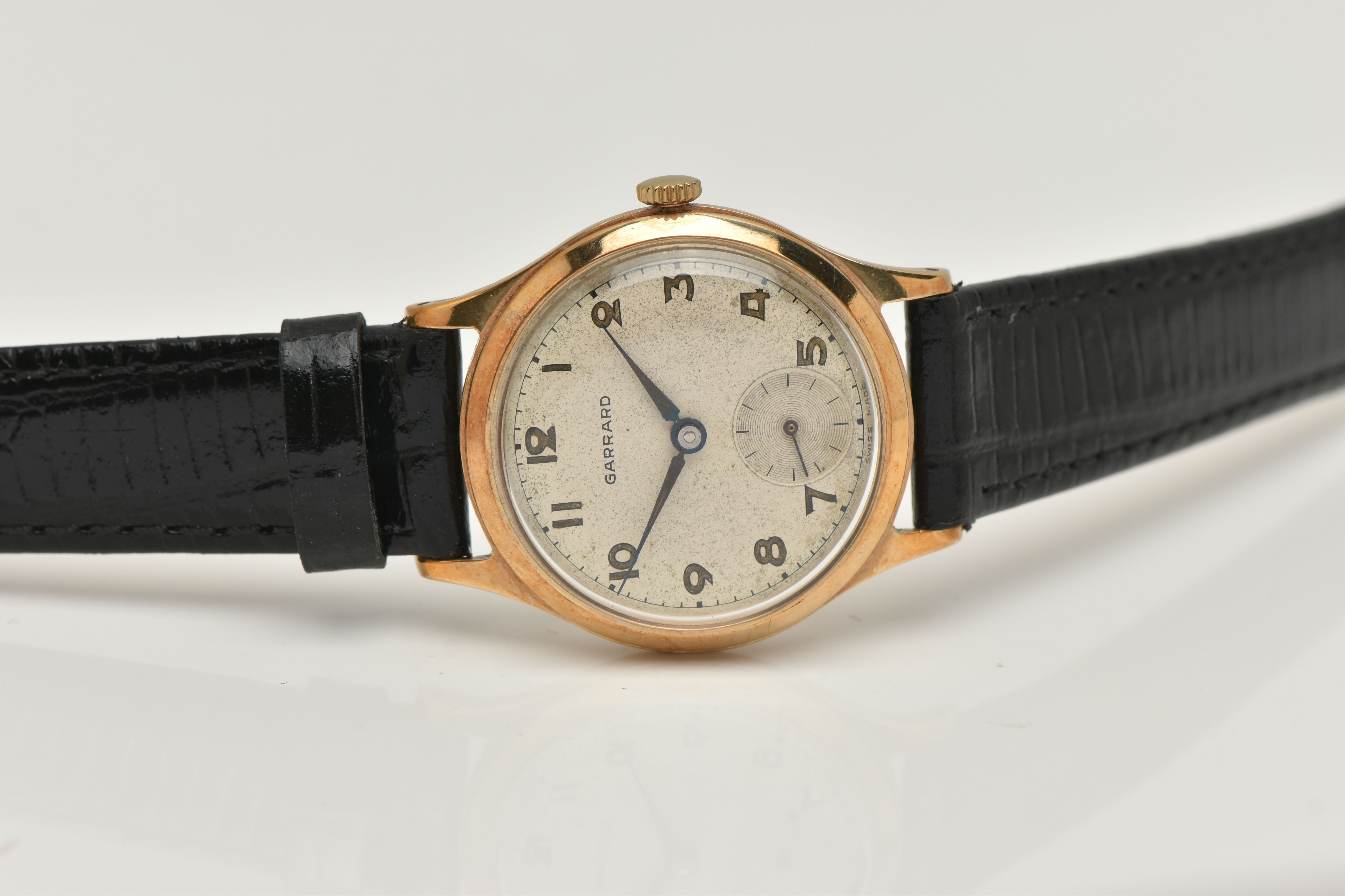 A 9CT GOLD 'GARRARD' WRISTWATCH, hand wound movement, round dial signed 'Garrard' Arabic numerals, - Image 4 of 6