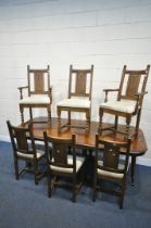 A FRENCH STYLE OAK EXTENDING DINING TABLE, with two additional leaves, raised on four turned legs,