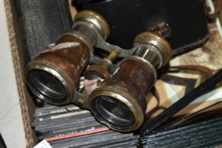 A BOX OF LANTERN SLIDES AND BINOCULARS ETC, to include black & white photographic lantern slides