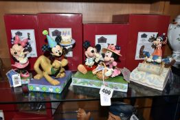 FOUR BOXED ENESCO DISNEY TRADITIONS FIGURES, designed by Jim Shore, comprising Easter Artistry no