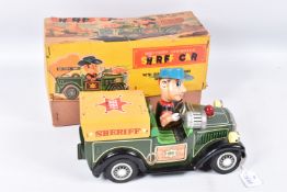 A BOXED SHOWA TN TOYS TINPLATE BATTERY OPERATED SHERIFF CAR, not tested, appears complete and in