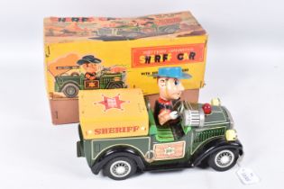 A BOXED SHOWA TN TOYS TINPLATE BATTERY OPERATED SHERIFF CAR, not tested, appears complete and in