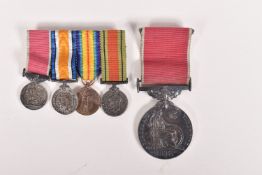 A BRITISH EMPIRE MEDAL AND MINATURE WW1/WW2 MEDALS, the BEM medal comes on a civilian ribbon and
