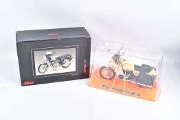 A BOXED SCHUCO B.M.W. R90/S MOTORBIKE MODEL, No.06520, 1/10 scale, with a cased Guiloy B.M.W.