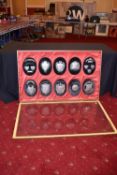 EARLY 20TH CENTURY BRITISH LEGION INTEREST: - A LATE 20TH CENTURY DISPLAY CASE CONTAINING TEN OVAL