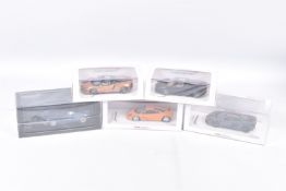 FIVE BOXED MCLAREN 1:43 SCALE MODELS to include a Welly McLaren GT in Bronze, a McLaren GT 2019 in