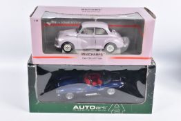 TWO BOXED 1:18 SCALE DIECAST MODEL CARS, to include an Autoart Jaguar XK SS 1956 in blue, item no