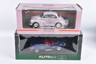 TWO BOXED 1:18 SCALE DIECAST MODEL CARS, to include an Autoart Jaguar XK SS 1956 in blue, item no