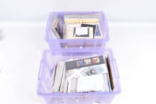 2 PLASTIC TUBS WITH MAINLY GB FDC & PHQ COLLECTION FROM 1970s TO 2000s. The PHQs mostly in stamped