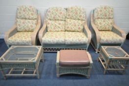 A PAINTED RATTAN SIX PIECE CONSERVATORY SUITE, comprising a two seater sofa, length 137cm x depth