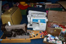 THREE SEWING MACHINES AND SEWING/HABERDASHERY ITEMS, to include a vintage electric Singer sewing