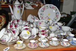 A GROUP OF BONE CHINA TEAWARE, comprising a Grosvenor 'High Summer' pattern coffee set, one coffee
