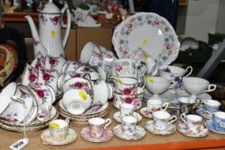 A GROUP OF BONE CHINA TEAWARE, comprising a Grosvenor 'High Summer' pattern coffee set, one coffee