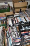 NINE BOXES OF HOME ENTERTAINMENT ITEMS to include CDs, DVDs and VHS cassettes, music includes a