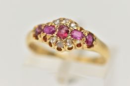 AN EARLY 20TH CENTURY RUBY AND DIAMOND RING, comprised of three oval cut rubies, two circular cut