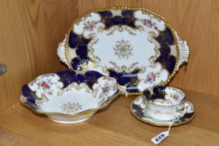 TWO COALPORT DISHES, together with a cup and saucer, cobalt blue panels, Y2665 pattern inside cup,