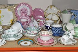 A SELECTION OF DECORATIVE TEA WARES ETC, to include a pink Royal Collection Faberge trio, puce