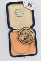 A BOXED 'DAMASCENE' COMPACT, of circular form featuring an oriental dragon, boxed signed inside '