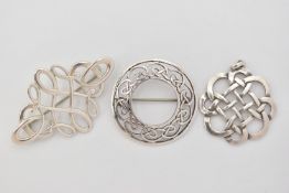 THREE ITEMS OF SCOTTISH JEWELLERY, to include an open work Celtic pattern pendant, fitted with a
