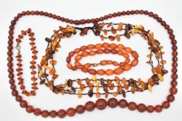 AMBER BEAD NECKLACES AND PLASTIC BEAD NECKLACES, to include an amber bead necklace knotted on a