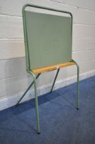 A GREEN PAINTED FOLDING TUBULAR METAL CHILDS REVOLVING CHALK BOARD, with a beech shelf, width 64cm x