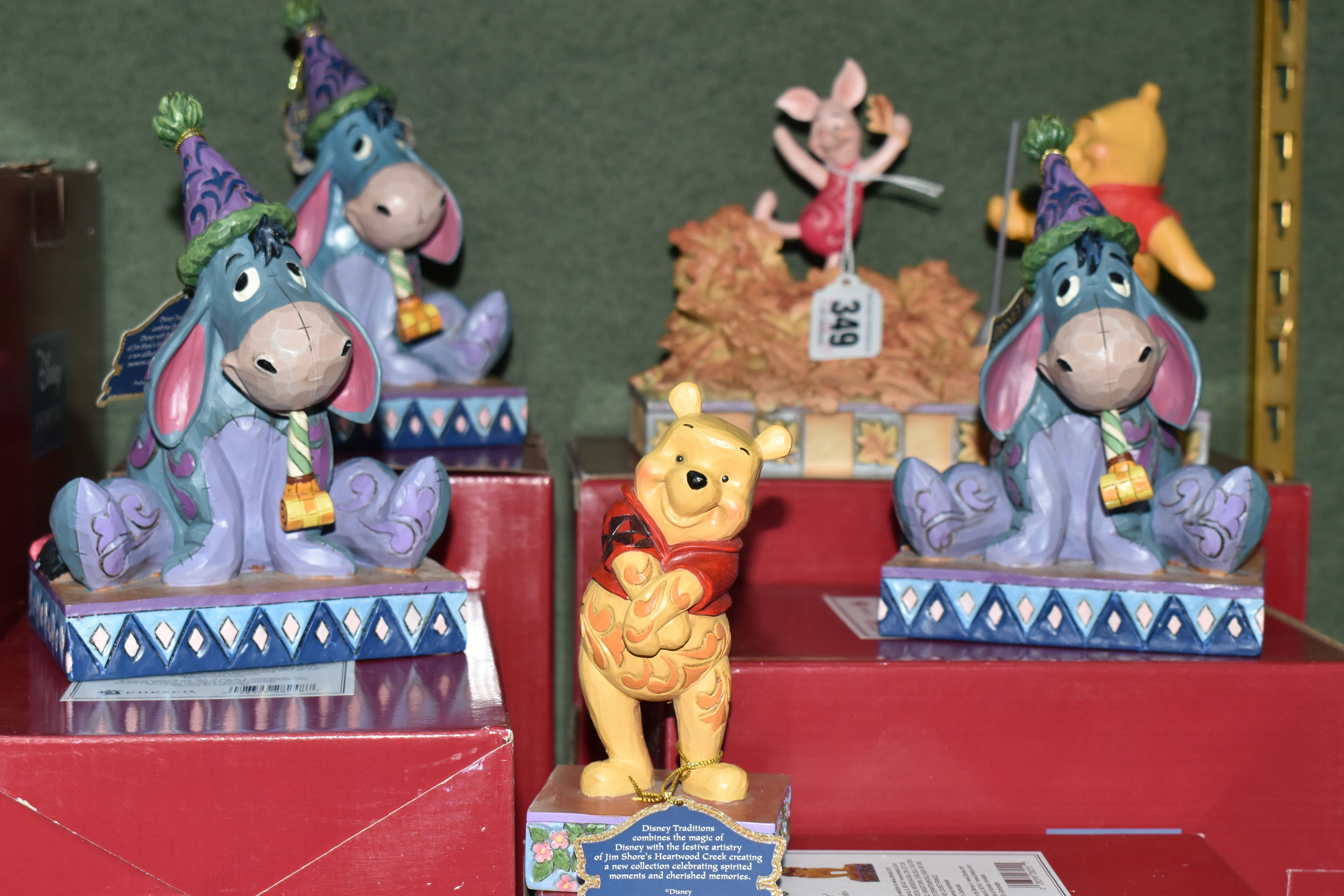 FIVE BOXED ENESCO DISNEY SHOWCASE 'WINNIE THE POOH' FIGURES, from Disney Traditions by Jim Shore,