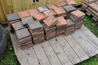 A QUANTITY OF WEATHERED VINTAGE GARDEN/PATHING TILES, in two colours (on a pallet, approx 160)