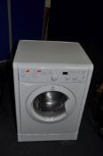 AN INDESIT IWD7415 WASHING MACHINE width 60cm depth 55cm height 85cm(PAT pass, powers up, spin cycle