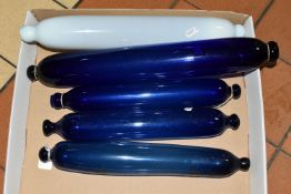 A BOX OF GLASS ROLLING PINS, mainly nineteenth century Bristol Blue glass examples, one showing