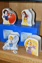 FOUR BOXED ENESCO 'DISNEY ENCHANTING COLLECTION' CERAMIC MONEY BOXES, comprising 'Some Day My Prince