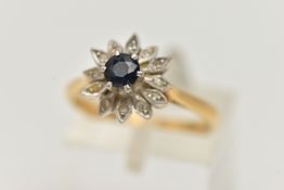 AN 18CT YELLOW GOLD CLUSTER RING, flower shape cluster set with a raised circular cut deep blue