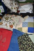 TWO BOXES OF TABLE LINEN AND CUSHIONS, to include two hand embroidered cushions, a patchwork