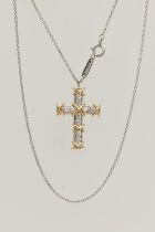 A 'TIFFANY & CO' 'SCHLUMBERGER' DIAMOND CROSS PENDANT, ten round brilliant cut diamonds prong set in