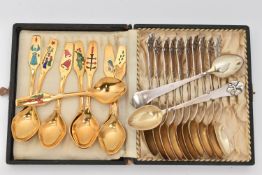 TWO SETS OF DANISH SPOONS, to include a set of eight yellow metal teaspoons, decorated with a