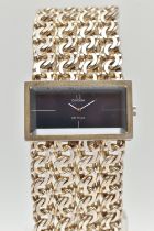 A LADIES SILVER 'OMEGA DE VILLE' WRISTWATCH, hand wound movement, rectangular dial signed 'Omega',