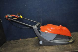 A FLYMO EASI GLIDE 330 LAWN MOWER with integrated grass collection (untested due to no cable)