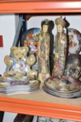 A GROUP OF COLLECTOR'S PLATES AND A PAIR OF CHINESE FIGURES, comprising a pair of male and female