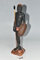 AN AUSTRALIAN MID-CENTURY PIETER VAN DER HELDER ABORIGINAL FIGURE, a slip cast ceramic figure of a